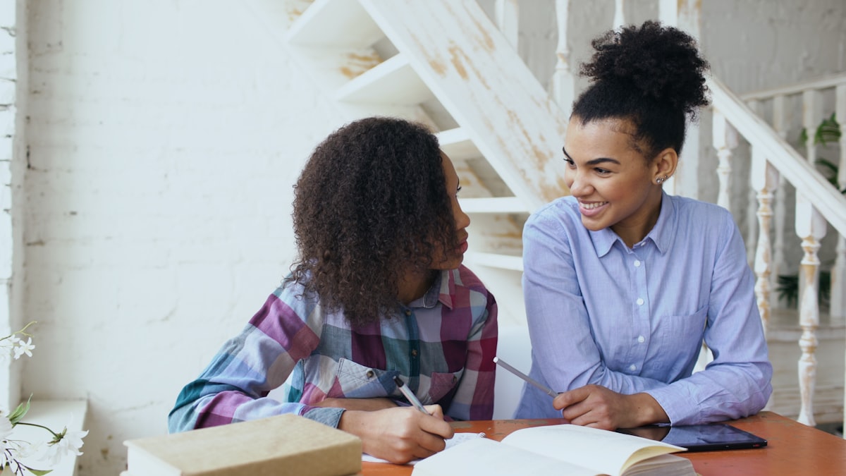 Two students engaged in an interactive study session